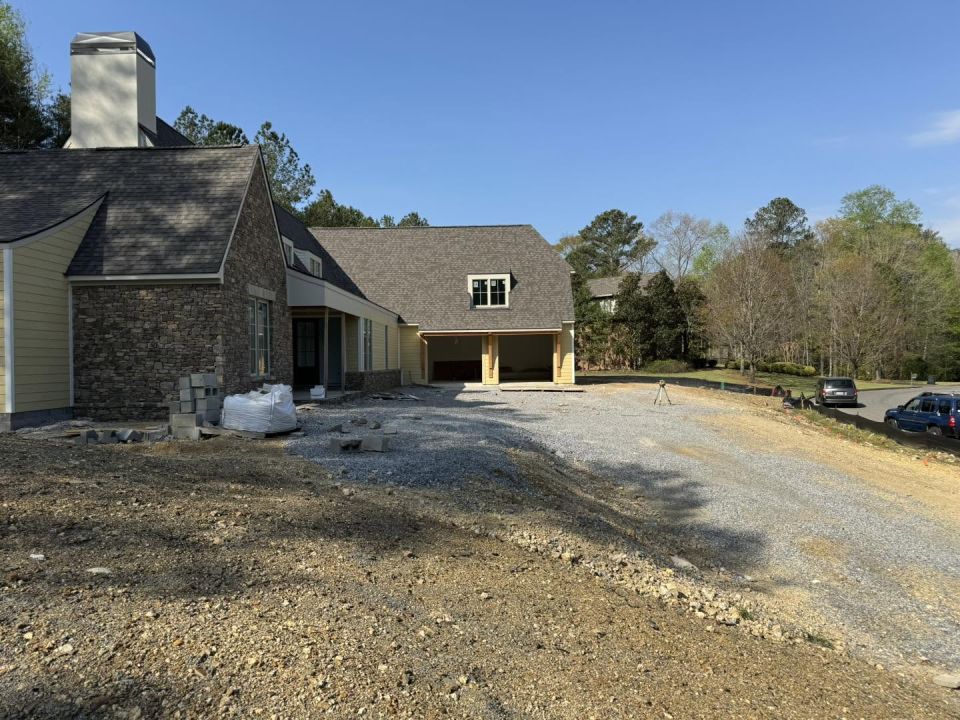 Back Fill And Final Grade On A Slab Home